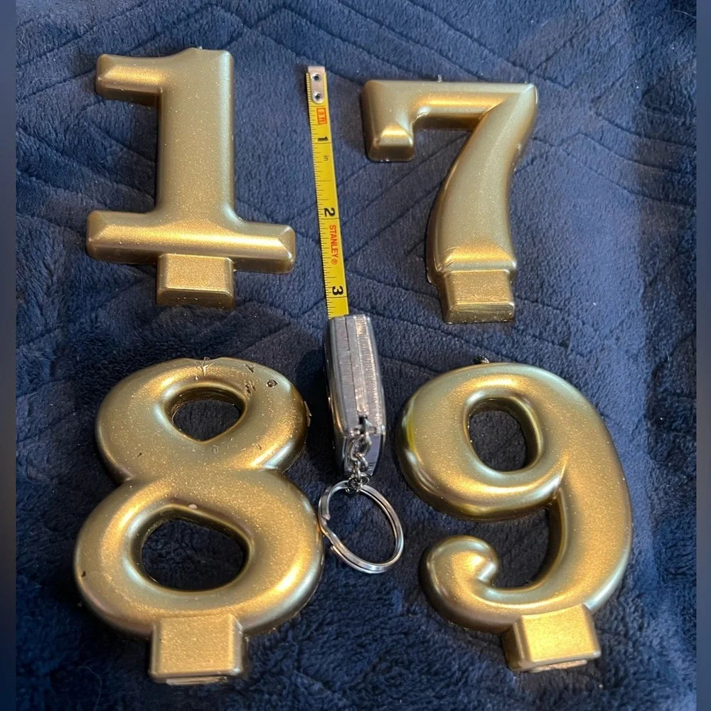 Numbered cake candles. Gold colored, 3” high